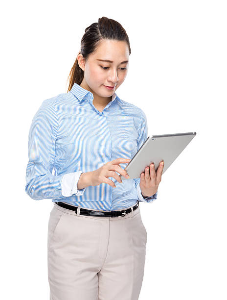 istock Businesswoman use of tablet 489946326