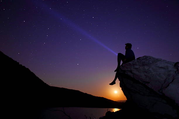 Searching the Galaxy Man looking at the Star - Space. sun exposure stock pictures, royalty-free photos & images