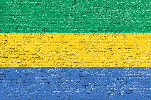 Photo of Gabon - National flag on Brick wall