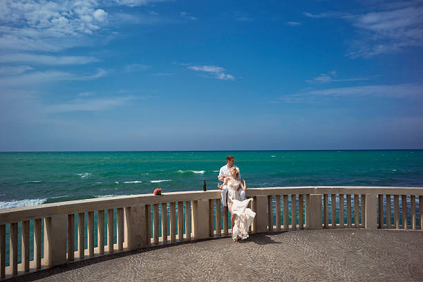 istock Wedding couple on terrace 489950358