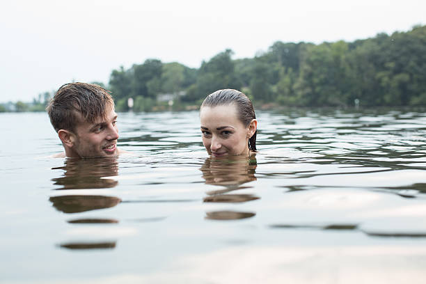 istock Two young teens at the lake 489952824