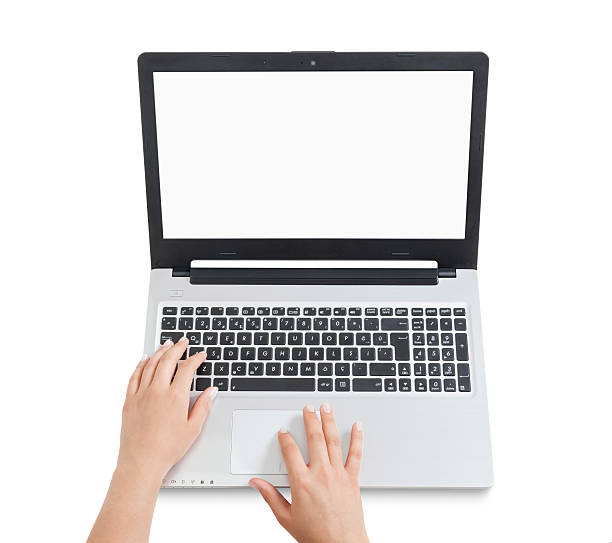 female hands using laptop. businesswoman using touchpad on white stock photo