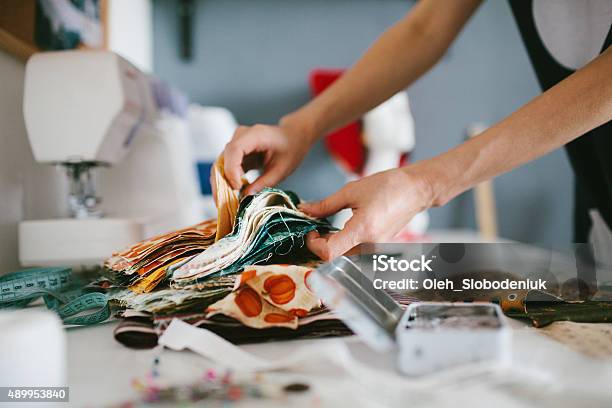 Tailor Working On Sewing Machine Stock Photo - Download Image Now - Sewing, Textile, Manufacturing
