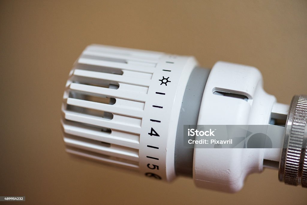 Radiator thermostat thermostatic valve on radiator close upthermostatic valve on radiator close up 2015 Stock Photo