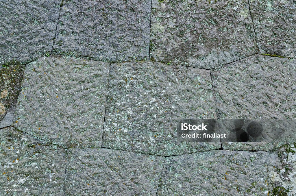 Background of stone wall texture Background of stone wall textureBackground of stone wall texture 2015 Stock Photo