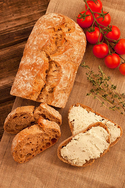 istock Freshly baked traditional bread with butter cream 489970251
