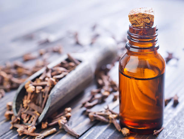 istock cloves and oil 489973165