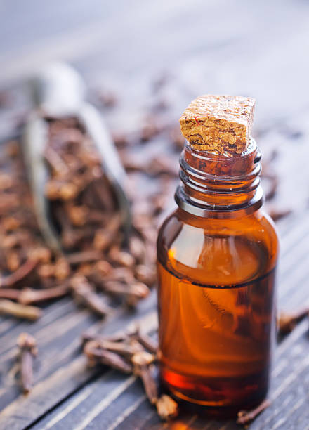 istock cloves and oil 489973545