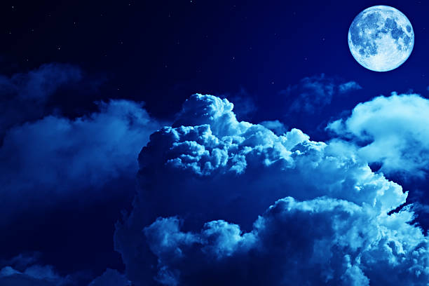 istock .Tragic night sky with a full moon and shining stars 489975773