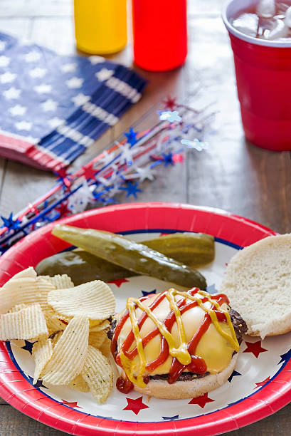 istock Cheeseburger with ketchup and mustard and a patriotic theme 489975789