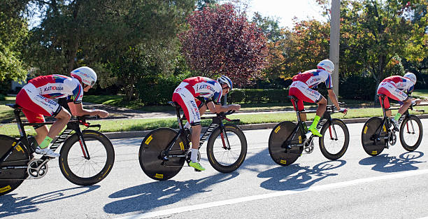 UCI Road World Championships Richmond, Virginia, United States- September 19, 2015: World class men riders wearing red and white cycle up an incline on Hermitage Road in Richmond, Virginia during time trials at the UCI Road World Championships, Saturday September 19, 2015. uci road world championships stock pictures, royalty-free photos & images