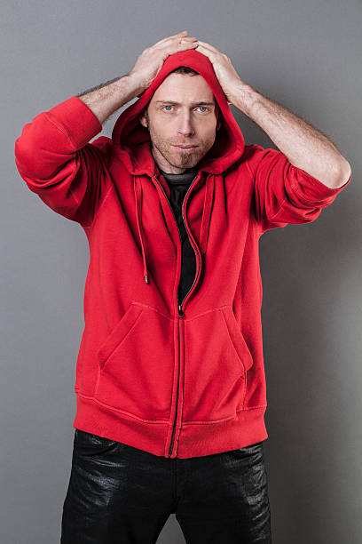 istock embarrassed 40s man putting his hands on head for mistake 489977236