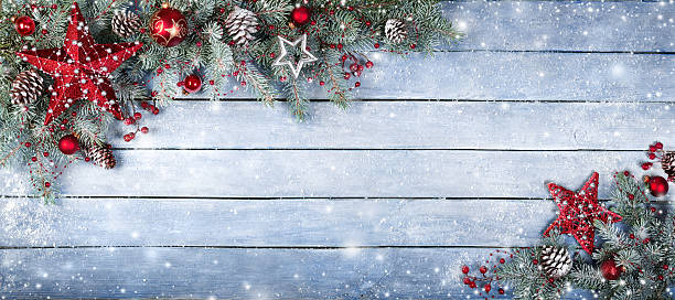 istock Christmas Fir Tree On Wooden Background With Snowflakes 489977498