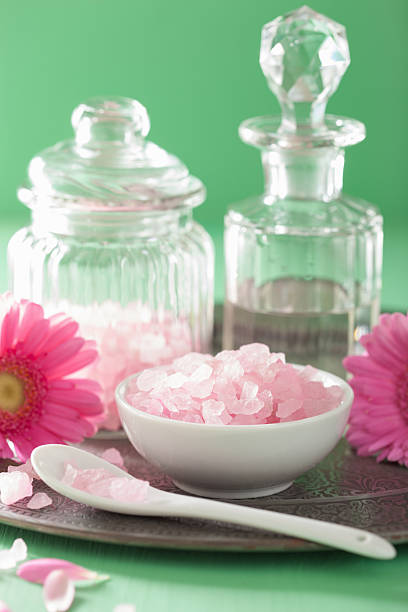 istock spa aromatherapy with pink salt gerbera flowers 489977576