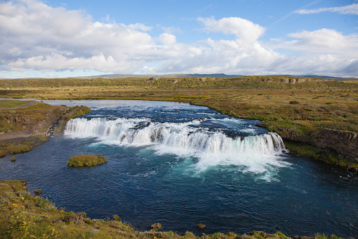 Faxi waterfall in Iceland with a fish ladder for salmon on the left