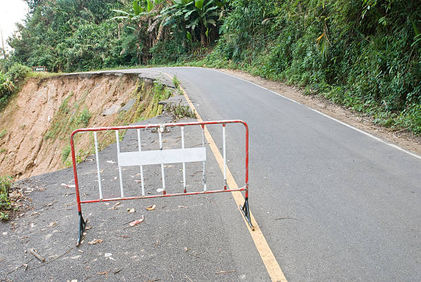 istock Damaged road from landslide on mountain 489980668