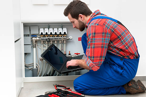 técnico no trabalho - heating engineer imagens e fotografias de stock