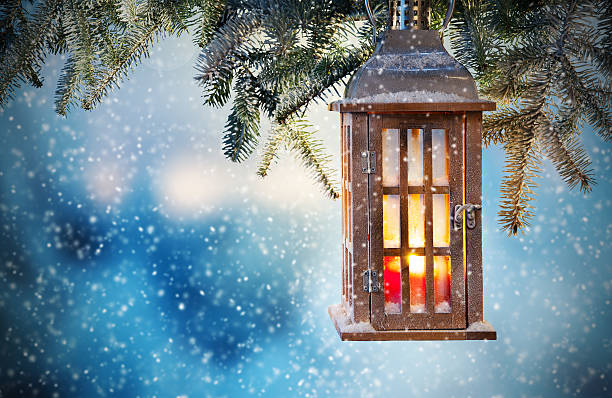 istock Christmas lantern hanging on fir branches 489980860