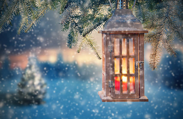 istock Christmas lantern hanging on fir branches 489980880