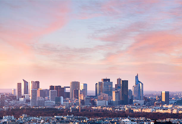 Skyscrapers skyline at sunset Skyscrapers skyline at sunset outer paris stock pictures, royalty-free photos & images