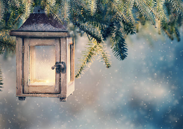 istock Christmas lantern hanging on fir branches 489980918