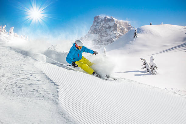 istock Skier skiing downhill in high mountains 489982790