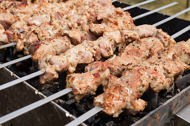 istock skewers frying on skewers 489983374
