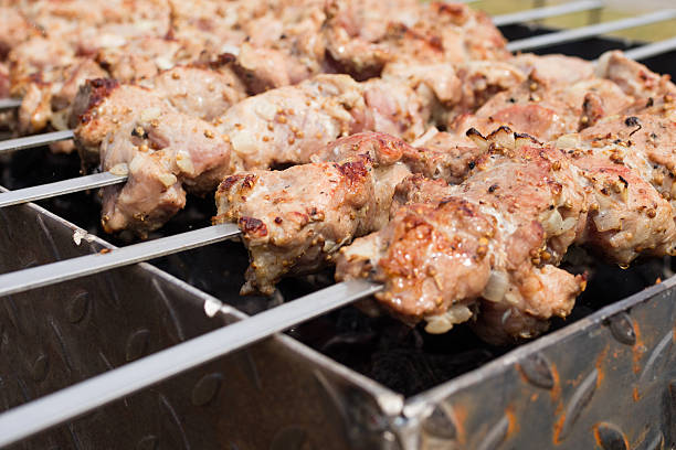 istock skewers frying on skewers 489983402
