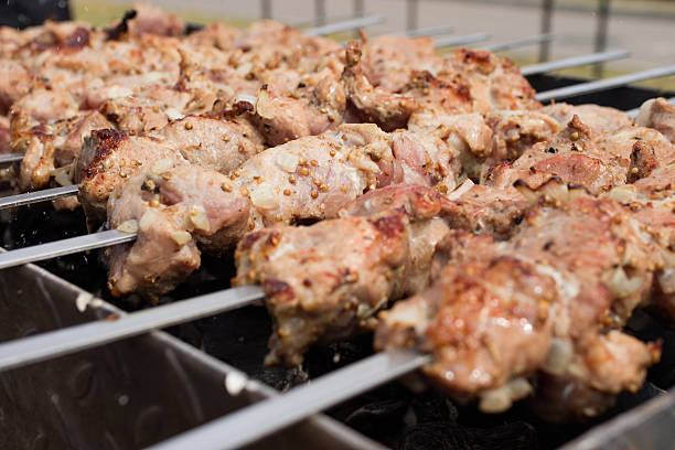 istock skewers frying on skewers 489983438