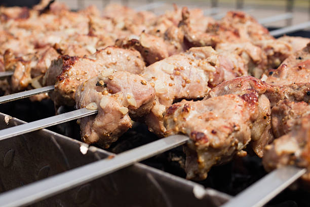 istock skewers frying on skewers 489983506