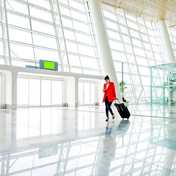 istock woman at airport 489983714
