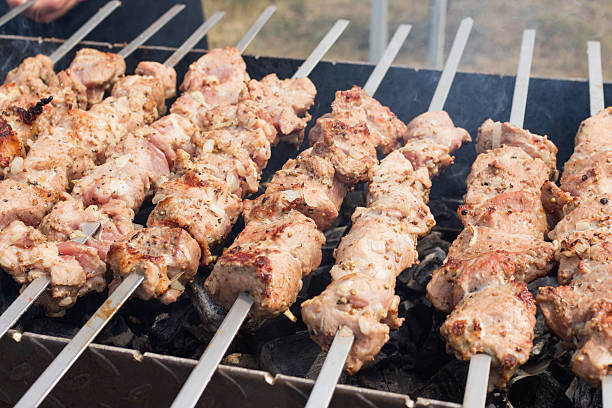 istock skewers frying on skewers 489983768