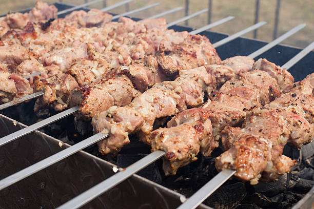 istock skewers frying on skewers 489983832