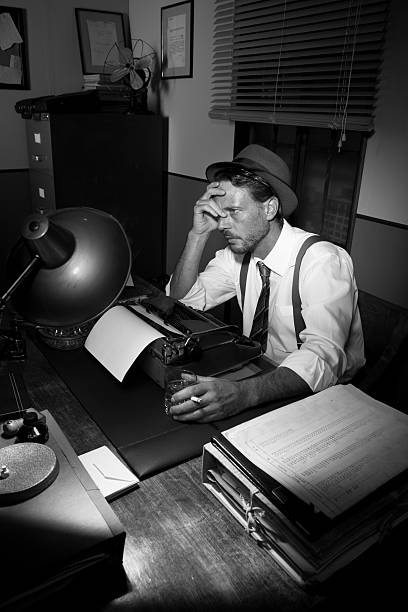 istock Exhausted reporter working late at night 489989610
