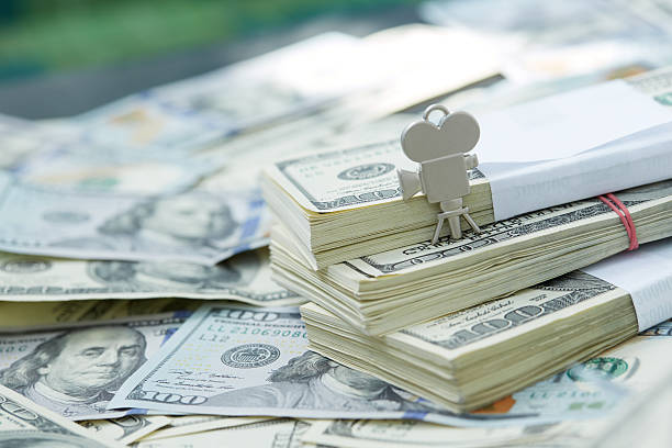 istock notes of dollars, movie camera 490013032
