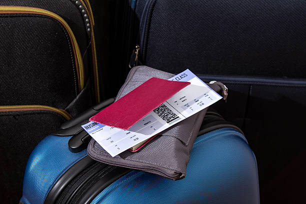 istock Airline ticket, passport and luggage 490013832