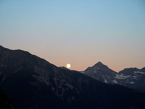 istock Full moon over alps in Swizerland 490014506