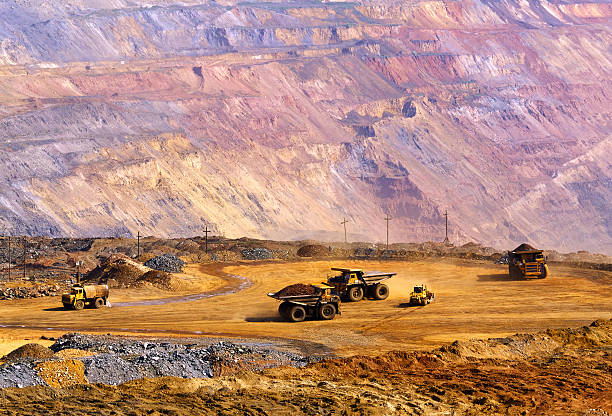 Landfill of depleted ore Big dump-body track bring the depleted iron ore to the dumps dump truck photos stock pictures, royalty-free photos & images
