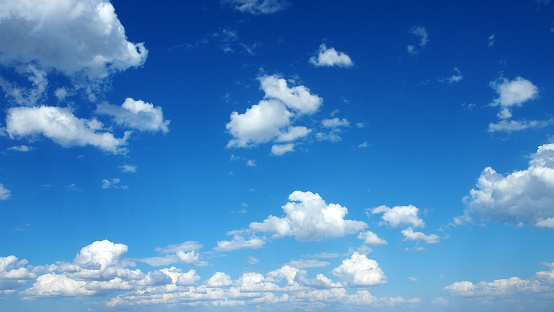 White clouds on the blue sky.