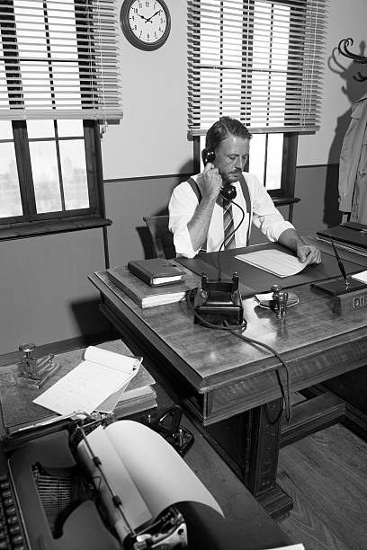 istock 1950s office: director on the phone 490015830