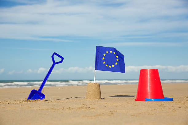 European communities flag on a beach.