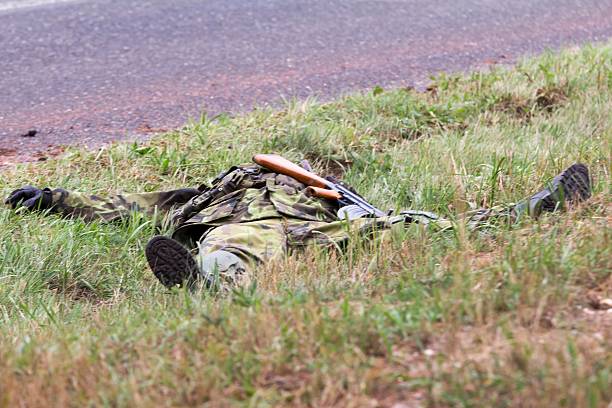 soldier in a camouflage suit fights