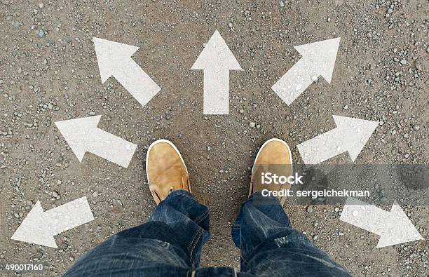 Yellow Boots On The Road Stock Photo - Download Image Now - Footpath, Single Lane Road, Occupation