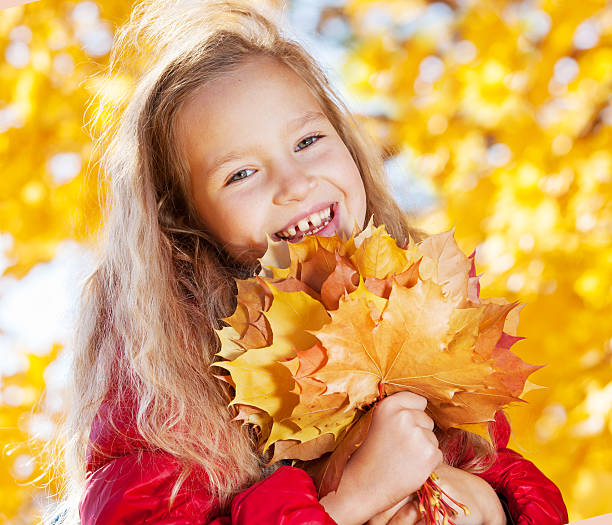 istock Girl at autumn 490018942