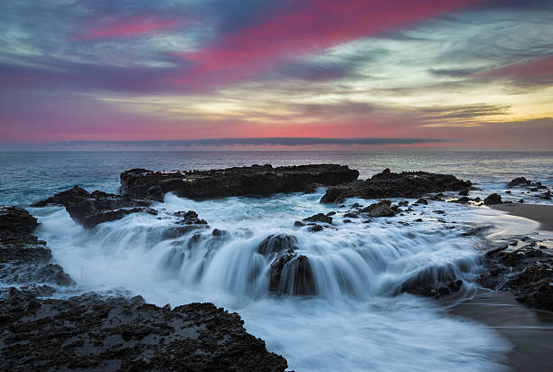 istock Dramatic Rocky Seascape with colorful sky 490019916