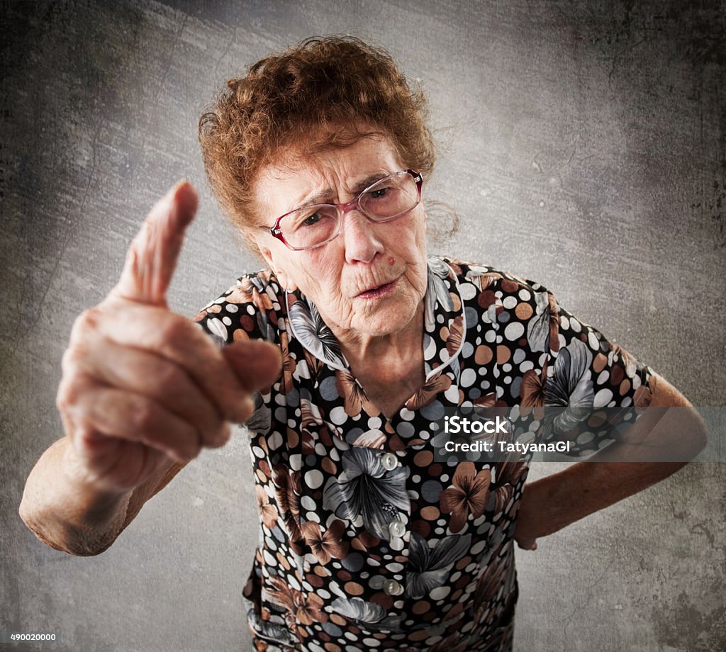 Scolded the old woman Scolded the old woman. Senior gives instruction. Anger grandmother Grandmother Stock Photo