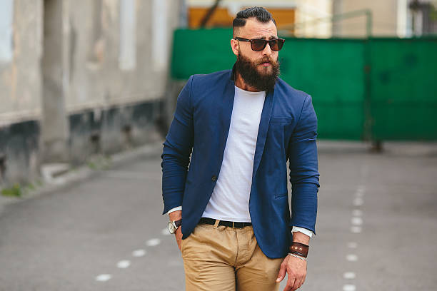 istock Stylish bearded man walks through the city 490020624