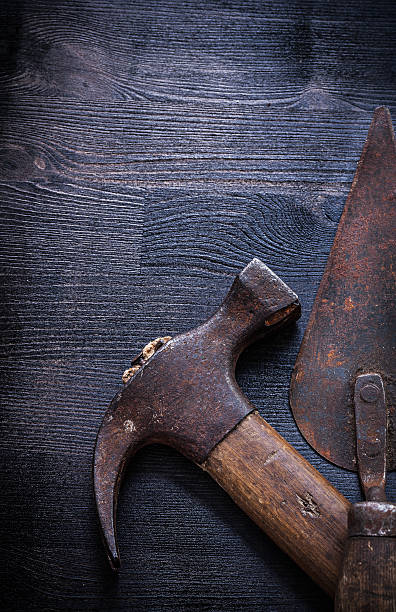 istock very close up old rusted hammer and spattle 490023980