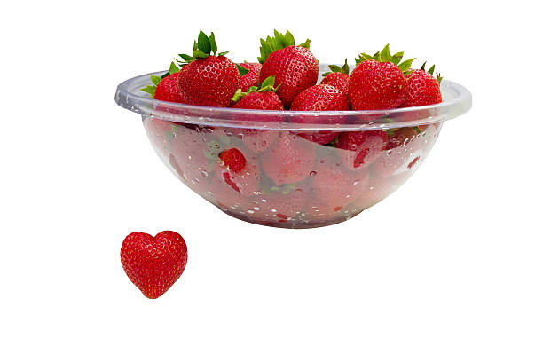 Strawberry Heart and Bowl of Strawberries stock photo