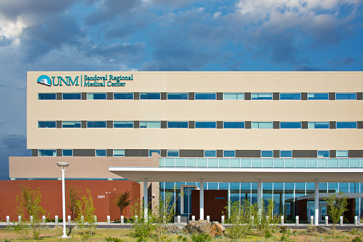 Rio Rancho, USA - July 8, 2013: Facade of the UNM Sandoval Regional Medical Center, a general medical and surgical hospital in Rio Rancho, NM. Rio Rancho is the largest city and economic hub of Sandoval County in the U.S. state of New Mexico. Since the 1990s, Rio Rancho has taken steps to become more independent from neighboring Albuquerque.